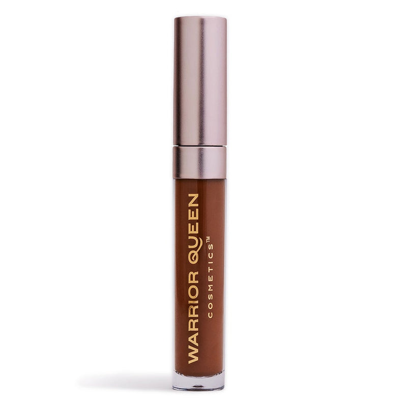 Power brown lip stain container labeled with gold Warrior Queen Cosmetics brand text.